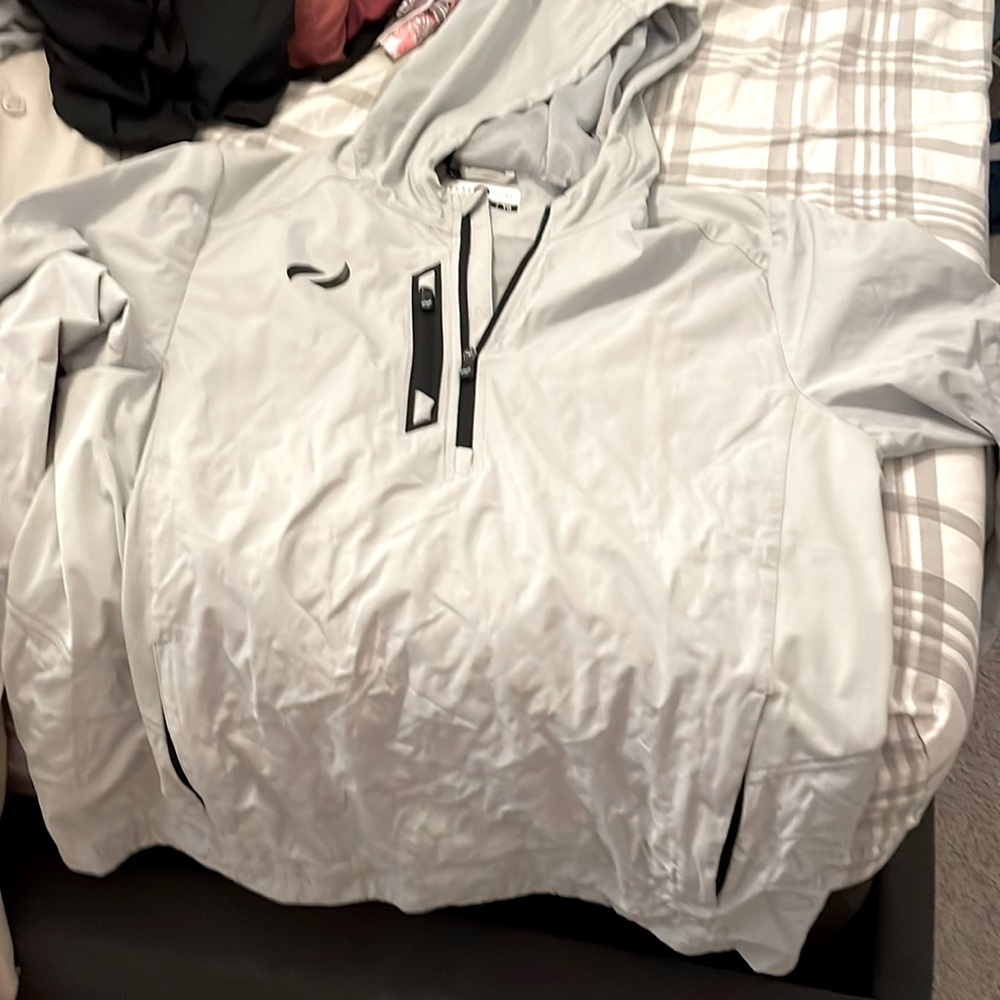 Pure hockey grey pull over rain jacket. Size Xl.